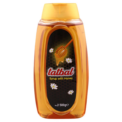 Tatbal - Syrup With Honey - 500g by Tatbal, featuring a honey dipper and chamomile flowers on the label, is an ideal honey syrup for soothing comfort.