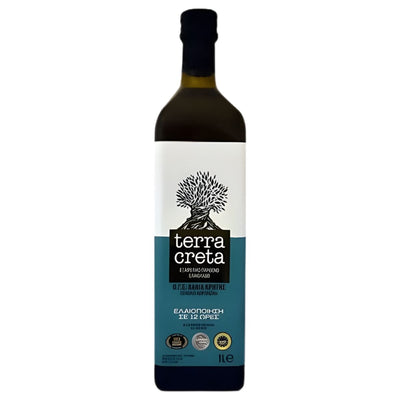 A 1L bottle of Terra Creta - Premium Extra Virgin Olive Oil, by Terra Creta, features a white and blue label with a black olive tree illustration, Greek text, and delivers a rich Mediterranean flavour.