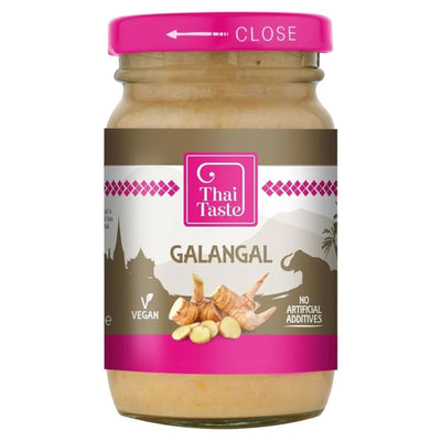A 114g jar of Thai Taste Galangal, vegan and free from artificial additives, ideal for adding authentic Thai flavor to your dishes.