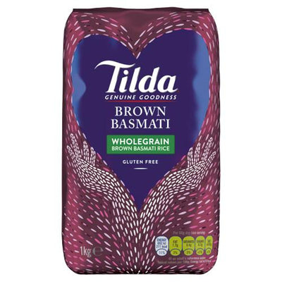 A 1kg bag of Tilda - Brown Basmati with a purple design, white patterned hands, and a gluten free label on the front.