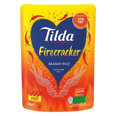 Package of Tilda - Firecracker Steamed Basmati Rice, spicy and gluten-free, weighing 250g.