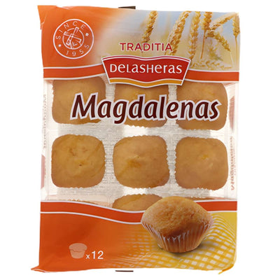 A 300g pack of Traditia Delasheras - 12 Square Magdalenas, featuring individually wrapped Spanish sponge cakes from Traditia Delasheras, with wheat and muffin images on the front.