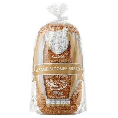 A 550g Twins Bakery Sesame Bloomer Bread sliced wholemeal sourdough loaf in a clear plastic bag.
