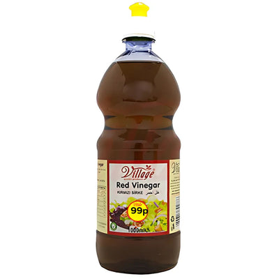 Village Red Vinegar 1L bottle with a yellow cap and 99p price label—perfect as cooking vinegar for your favorite recipes.
