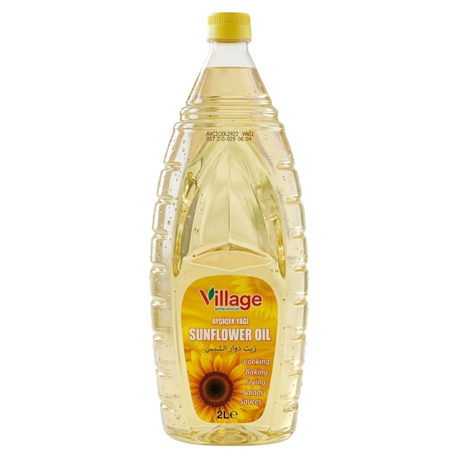 Village - Sunflower Oil - 2L comes in a plastic bottle with a yellow cap and sunflower label. This versatile Village oil is ideal for baking, frying, salads, sauces, and more.