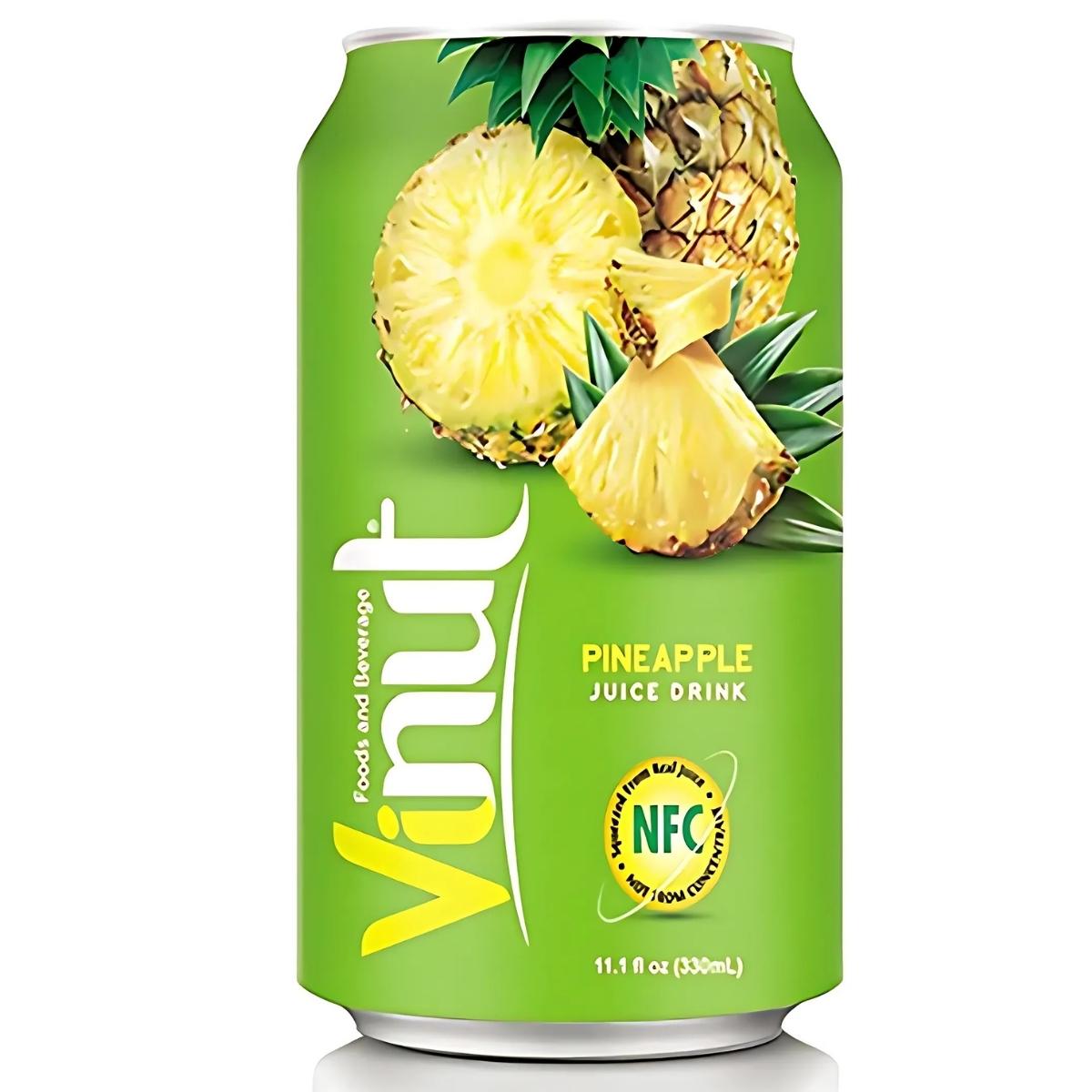 The vibrant green can of Vinut - Pineapple Juice Drink, adorned with pineapple slices, is marked "11.1 fl oz (330ml)" and "NFC", making it a refreshing, healthy choice.