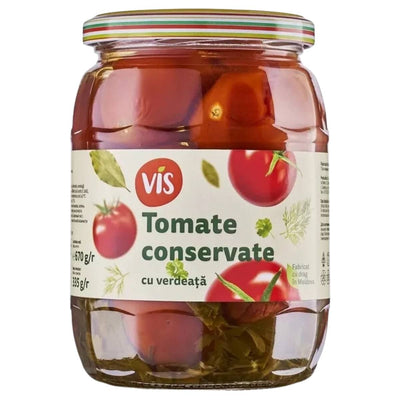 A 670g glass jar of Vis Tomate Conservate cu Verdeata (Pickle Tomato with Dill & Herbs) features whole tomatoes and herbs, and has Romanian labeling for an authentic Eastern European flavor.