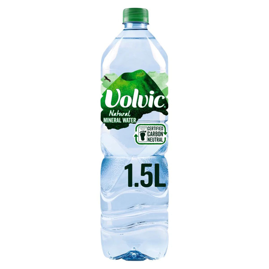 A 1.5L bottle of Volvic Natural Mineral Water featuring a green cap and a carbon neutral label from the Volvic brand.