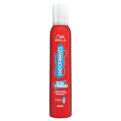 Red bottle of Wella Shockwaves hair product on a white background