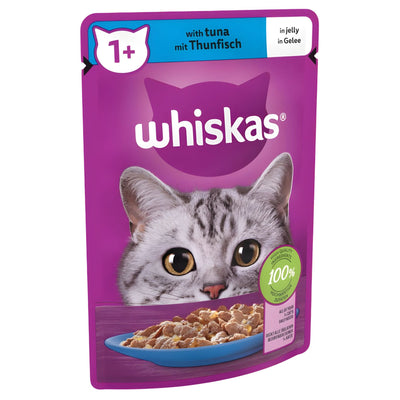 Whiskas 1+ Adult Wet Cat Food Pouch in Jelly with Tuna (85g) features a gray cat on the pack and shows tuna in jelly on a blue plate, ideal for cats aged 1 year and above.