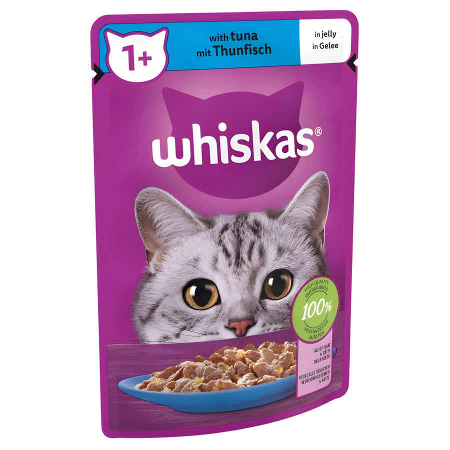 Whiskas 1+ Adult Wet Cat Food Pouch in Jelly with Tuna (85g) features a gray cat on the pack and shows tuna in jelly on a blue plate, ideal for cats aged 1 year and above.