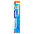 A packaged Wisdom Xtra Clean Angled Filaments Toothbrush (medium, blue) features angled bristles for deep cleaning.