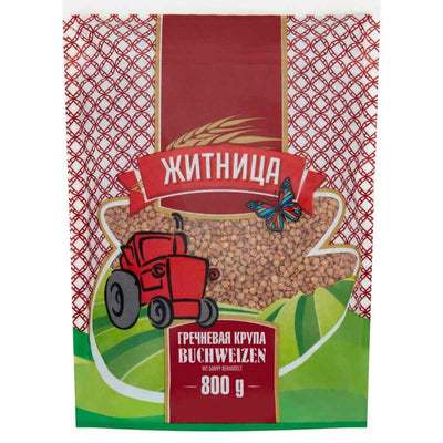 The 800g Zhitnica package of steam-treated buckwheat, labeled in Russian, features a red tractor and butterfly against a red and green design. Explore the nutritional details of this wholesome grain, perfect for health-conscious individuals.