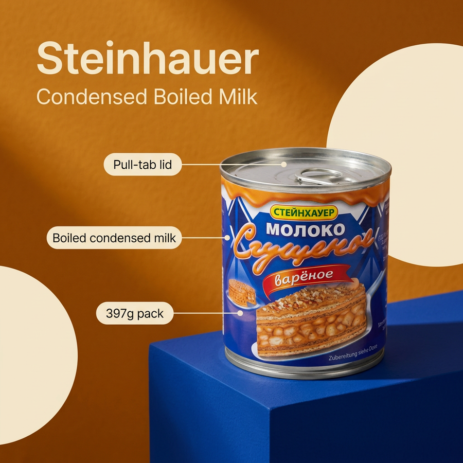 A can of Steinhauer Condensed Boiled Milk displayed on a blue pedestal against a warm brown background with cream shapes. White text on the image highlights product features: 'Pull-tab lid,' 'Boiled condensed milk,' and '397g pack.