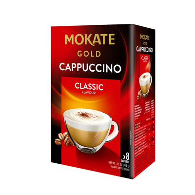 A box of Mokate Gold Cappuccino with 8 sachets, featuring a creamy cappuccino cup and coffee beans on the front.