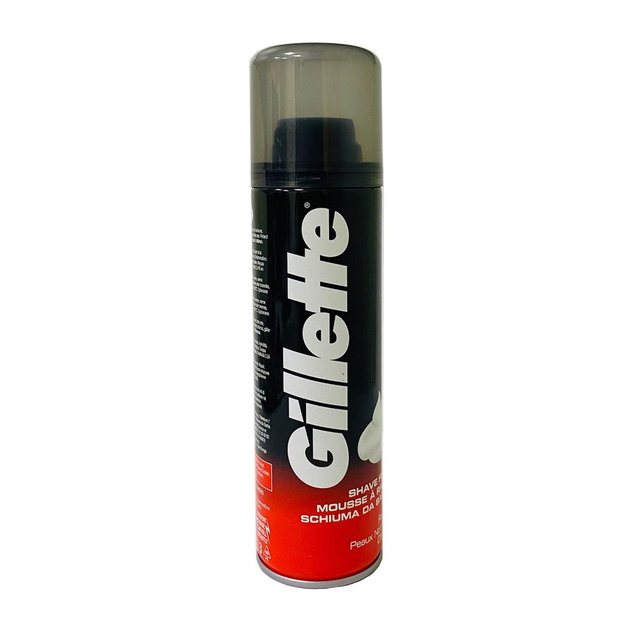 A 200 ml can of Gillette Shave Foam Regular, featuring a black cap and red-and-black label, is displayed against a plain white background.