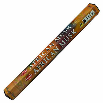 A rectangular box of HEM - African Musk Incense (20 sticks) featuring the HEM brand logo and safety icons on the packaging.