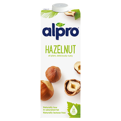 A 1L carton of Alpro Hazelnut Drink featuring hazelnuts and green leaves on white. This tasty plant-based milk is low in saturated fat, lactose free, and comes in sustainable packaging.