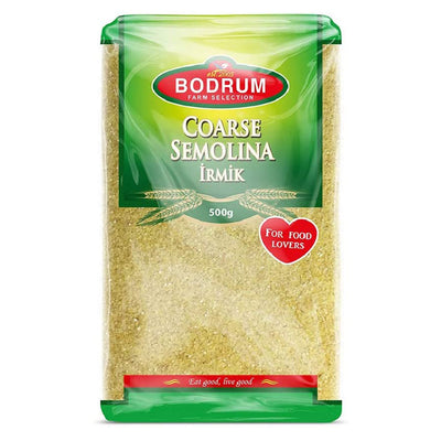 A 500g pack of Bodrum - Coarse Semolina (İrmik) with green and red branding, featuring a "For Food Lovers" label and a clear window showing yellow granules—ideal for traditional desserts.
