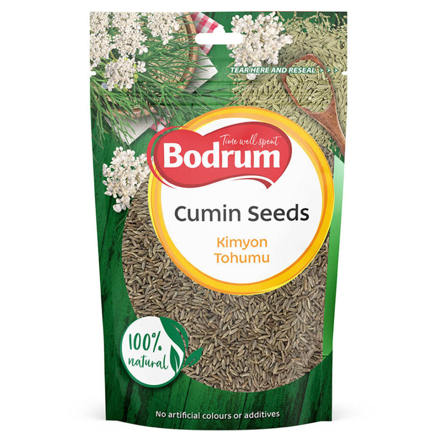 A green and white Bodrum Cumin Seeds 100g pack labeled "Kimyon Tohumu" displays cumin seeds inside and claims "100% natural," free from artificial colors or additives.
