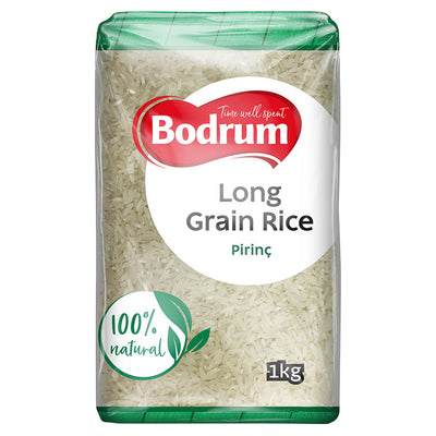 A 1kg pack of Bodrum Long Grain Rice labeled "100% natural" and "Pirinç," featuring clear packaging with green and red accents. Brand: Bodrum.