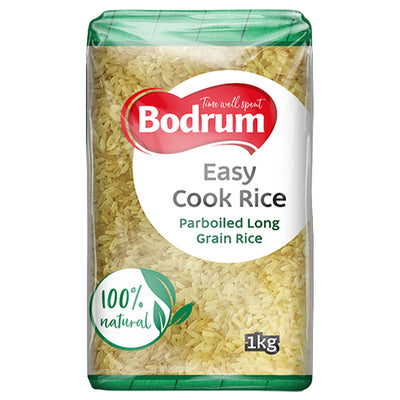 A 1kg Bodrum Easy Cook Rice, a parboiled long grain rice labeled 100% natural, comes in a clear plastic bag.