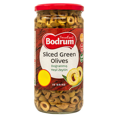 A 720g glass jar of Bodrum Sliced Green Olives with a red lid and a label featuring olive images and product details.