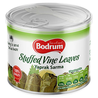 A 400g can of Bodrum Stuffed Vine Leaves, a Mediterranean appetizer called "Yaprak Sarma," features nutritional info and a 100% quality badge on the front.
