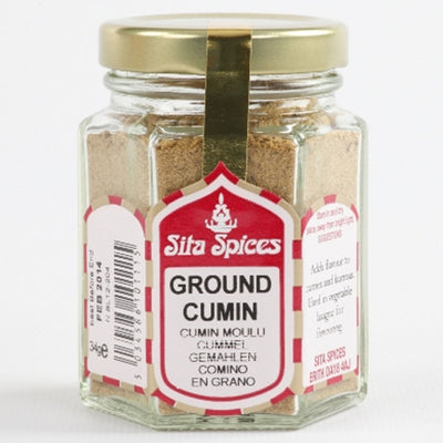 Sita Spices - Ground Cumin - 25g comes in a hexagonal glass jar with a gold lid, multilingual labels, and a red and white design—ideal for adding premium flavor to global dishes.